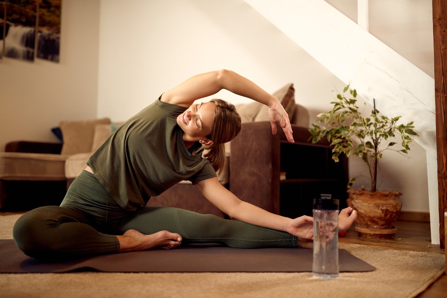 female doing stretching or mild exercise at home