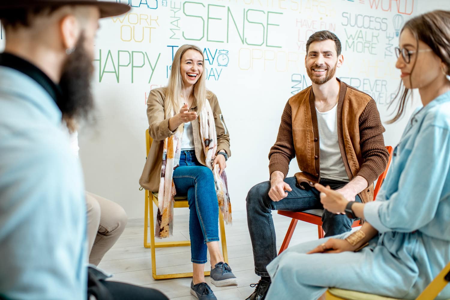 group therapy concept, happy smiling individuals talking to each other