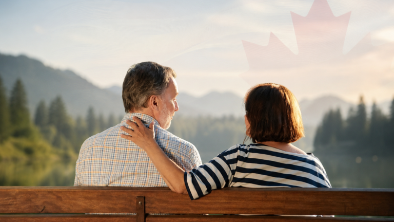 image of an adult couple, sitting beside each other by the lake