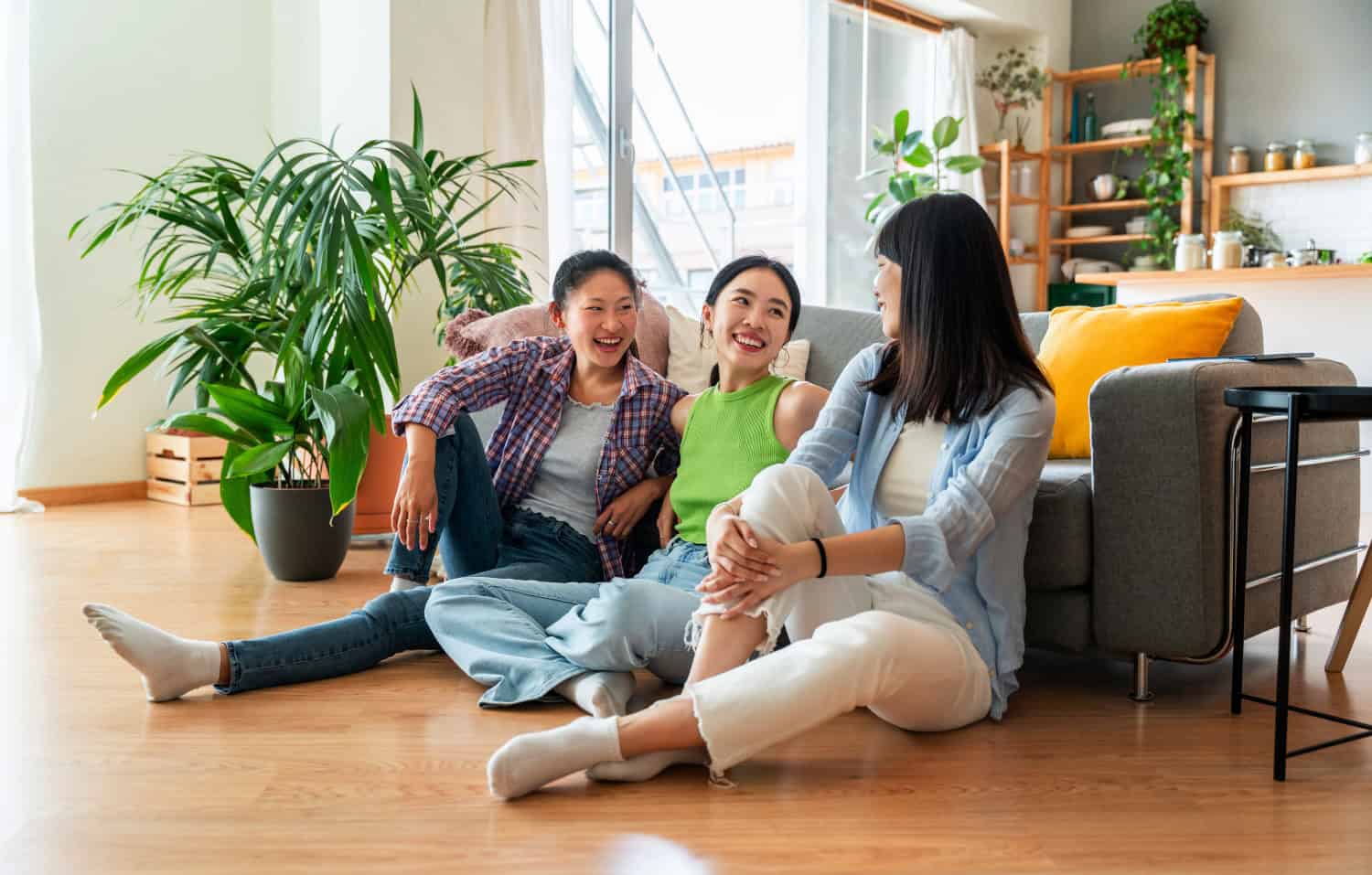 three friends chatting and smiling, concept of friendship, connection